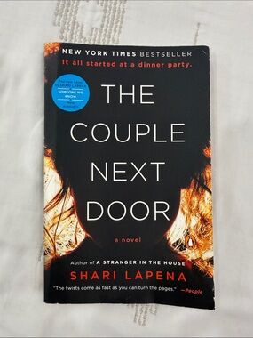 The Couple Next Door - Black Paperback Novel